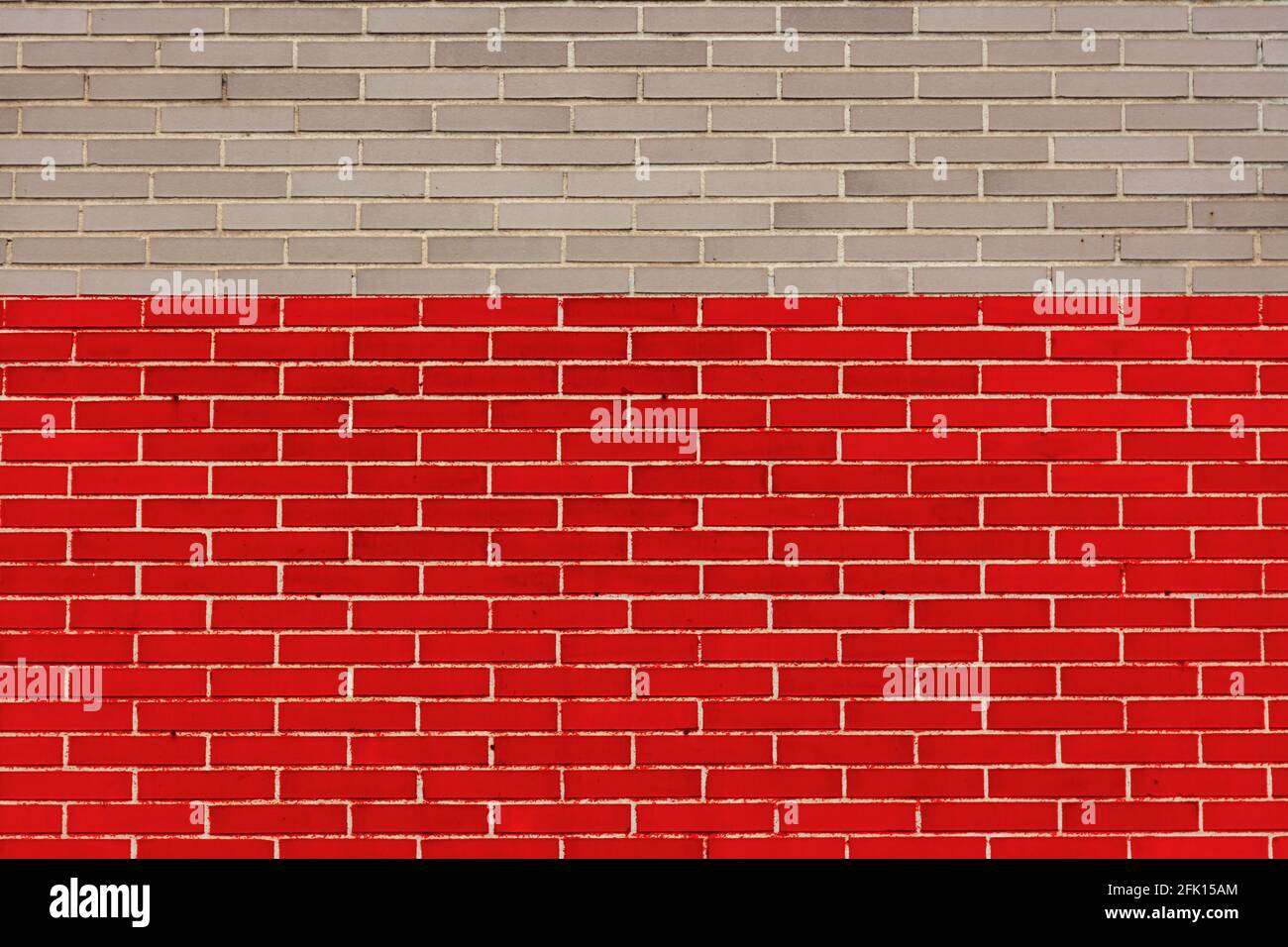 Muro di mattoni grigio e rosso. Con spazio di copia da utilizzare come sfondo o disegni. Simbolismo. Colore del nastro per la giornata di sensibilizzazione Foto Stock