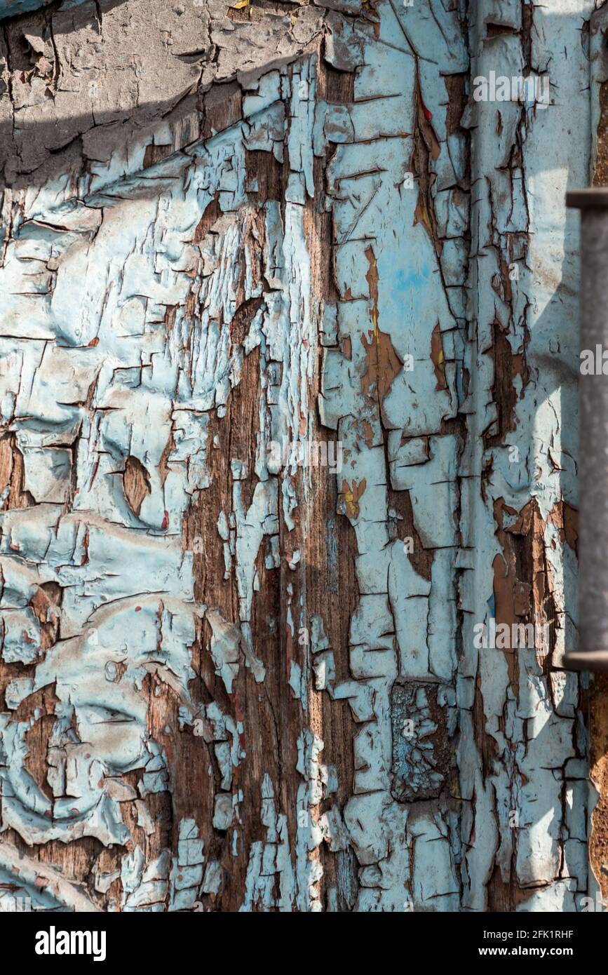 texture vecchio muro con vernice blu primo piano Foto Stock