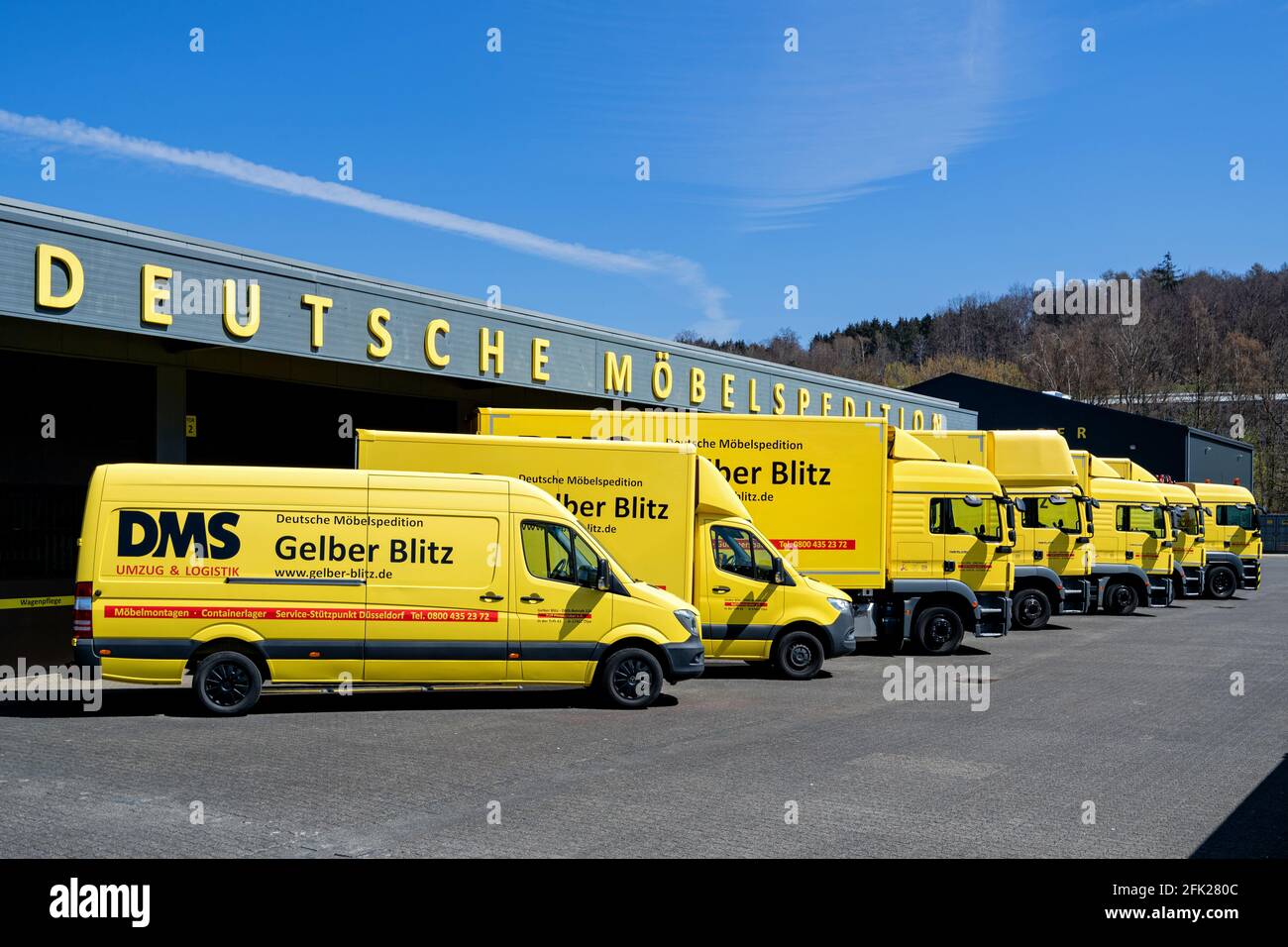 DMS Gelber Blitz camion al deposito. Foto Stock