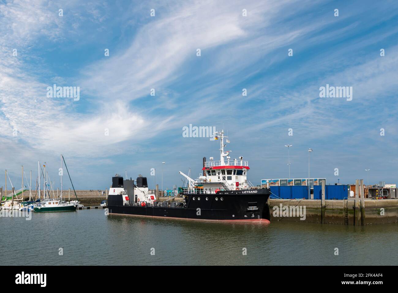 Nave multiuso MS Leysand presso il molo di Neuharlingersiel, bassa Sassonia, Germania, Europa Foto Stock