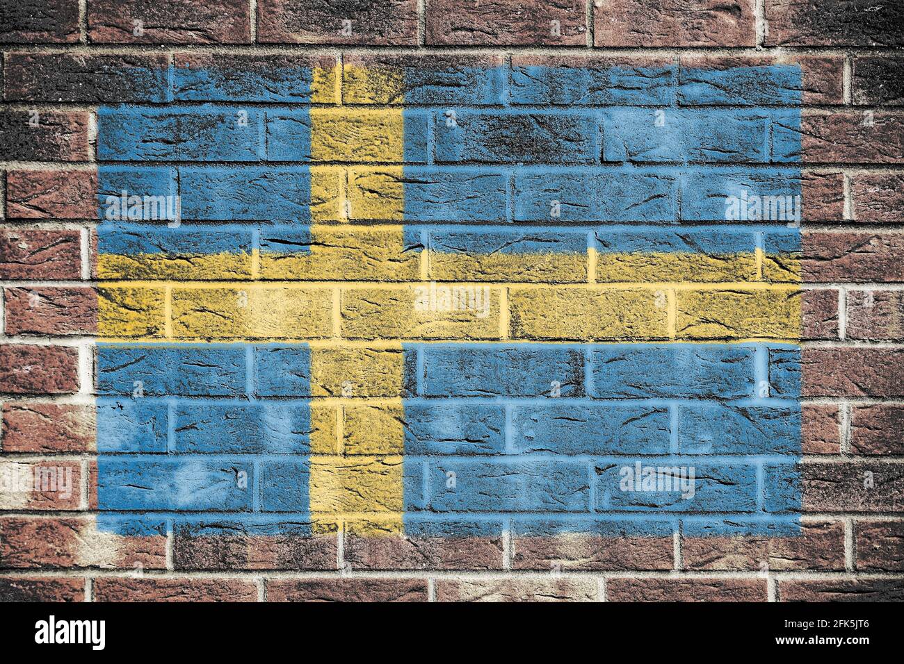 Bandiera della Svezia su un muro di mattoni di fondo Foto Stock