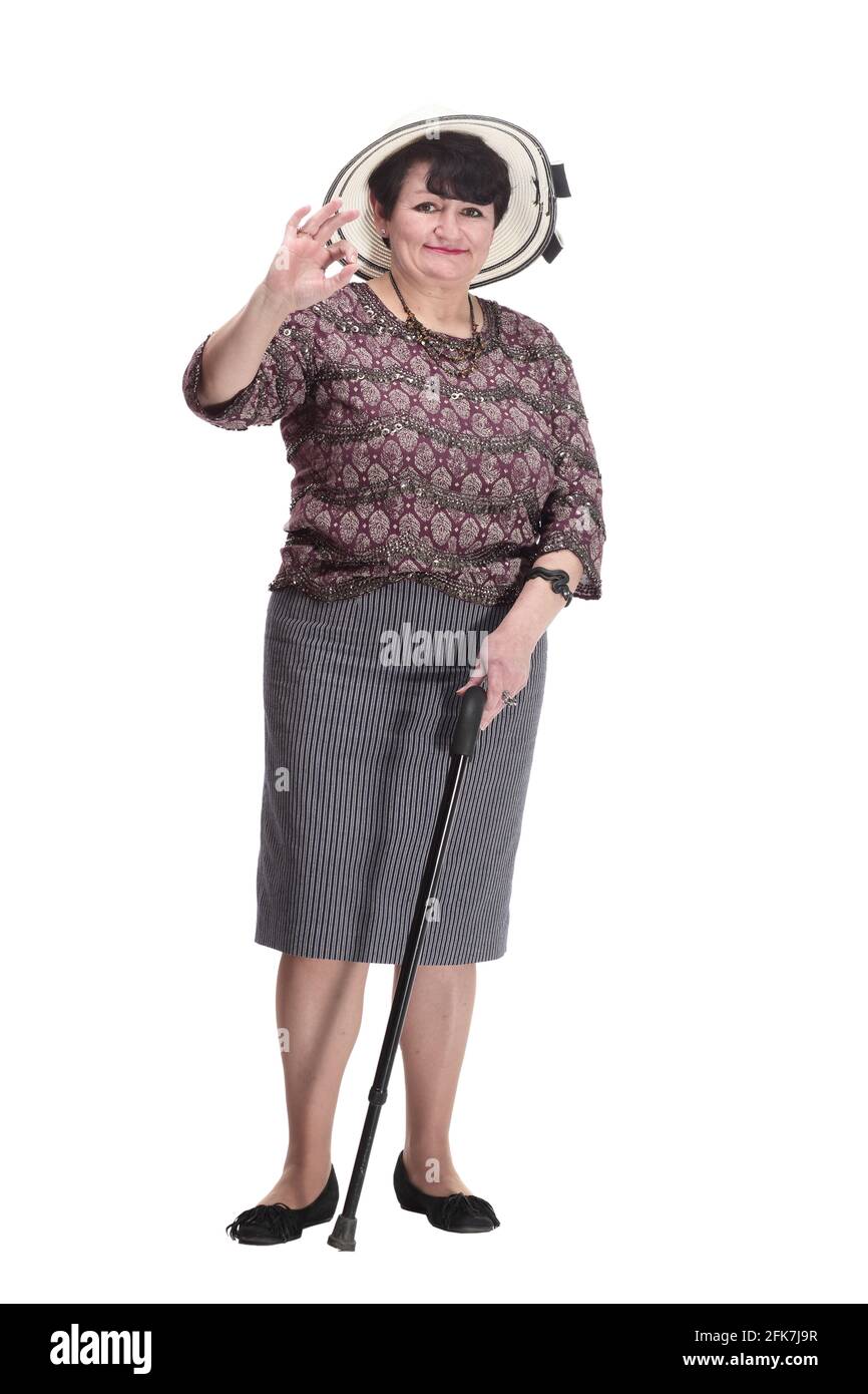 donna anziana in un cappello estivo che dà un pollice in su Foto stock -  Alamy
