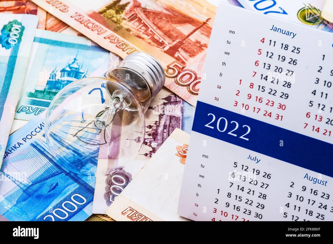 Attività di pianificazione per l'anno 2022. Situazione del denaro. Rubli e calendario per il 2022. Pagamento per elettricità. Foto Stock