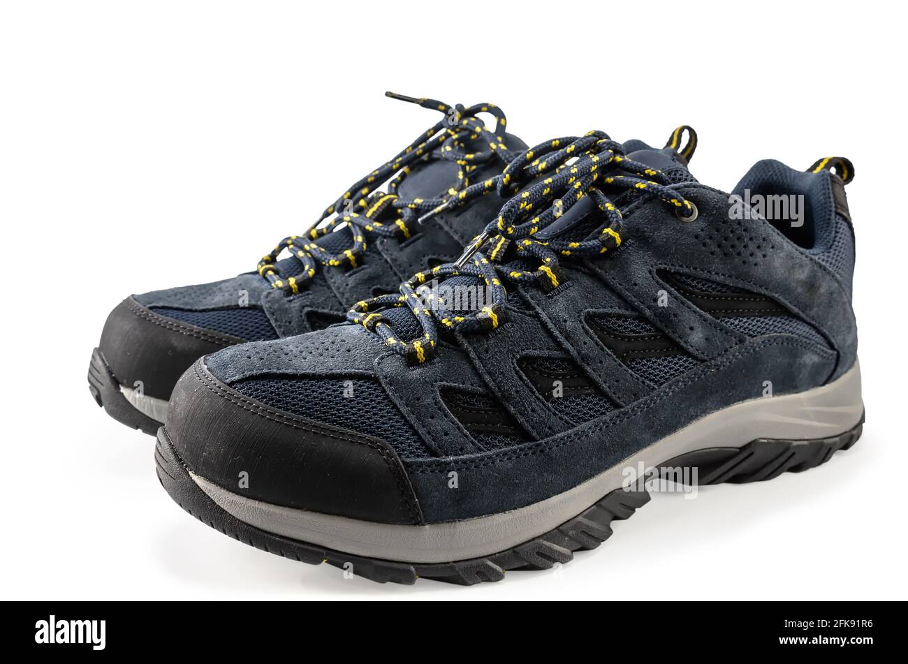 Coppia di sneakers alla moda su sfondo bianco Foto Stock