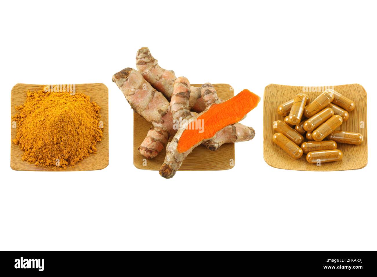 Rizoma curmerico, polvere e capsule isolate su bianco Foto Stock