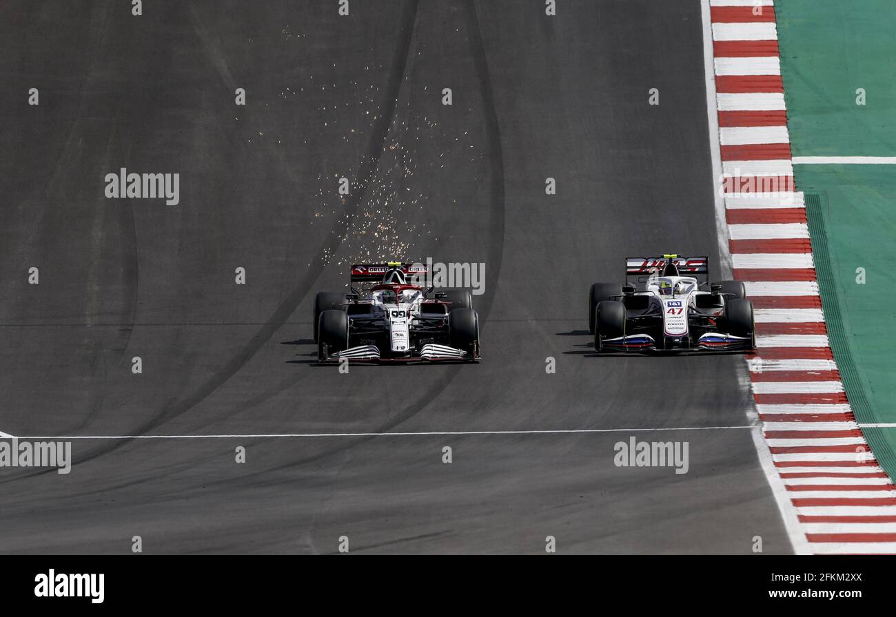 99 GIOVINAZZI Antonio (ita), Alfa Romeo Racing ORLEN C41, azione e 47 SCHUMACHER Mick (ger), Haas F1 Team VF-21 Ferrari, azione durante la Formula 1 Heineken Grande Premio de Portugal 2021 dal 30 aprile al 2 maggio 2021 sul circuito Internazionale Algarve, a Portimao, Portogallo - Foto DPPI / LiveMedia Foto Stock