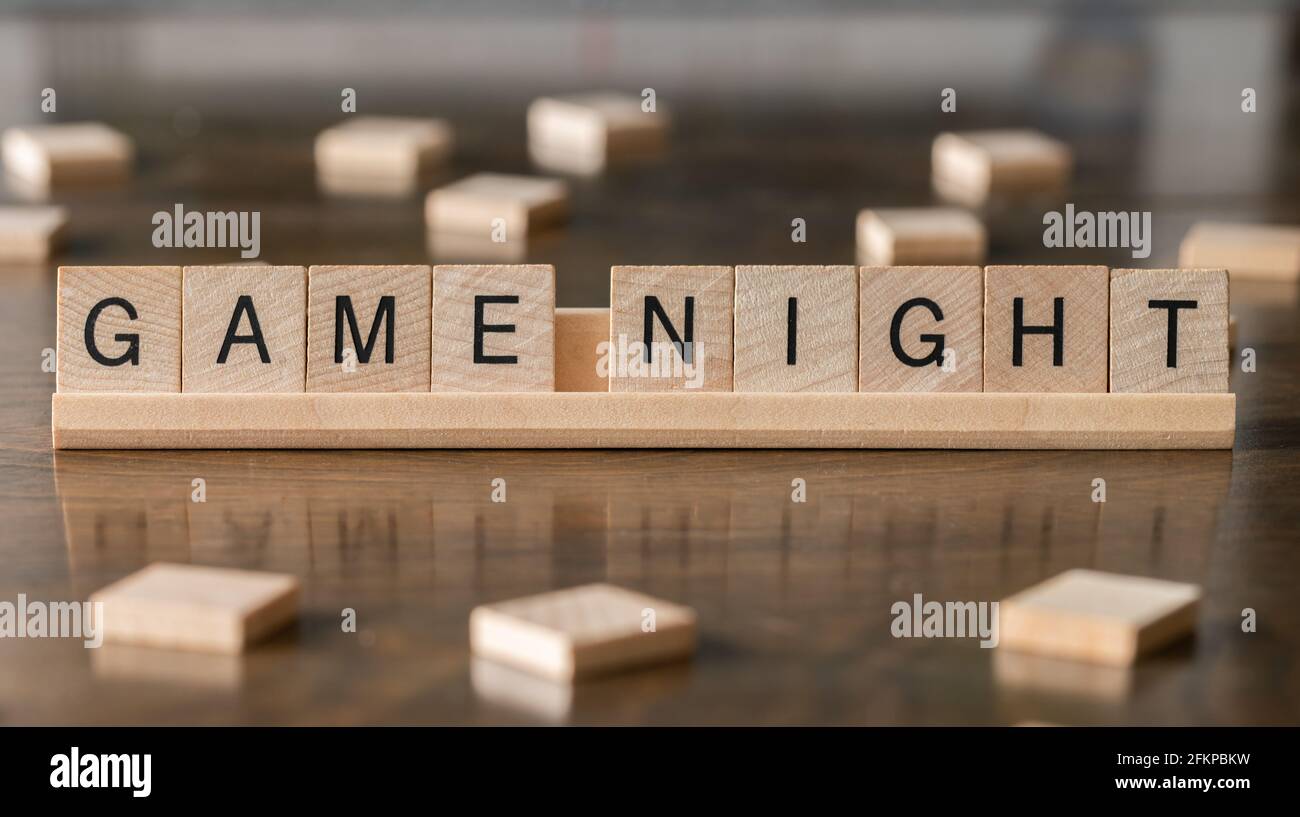 Piastrelle di legno ortografia 'Game Night' Foto Stock