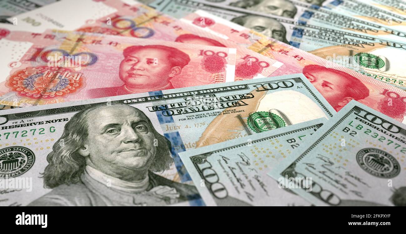 Sfondo della valuta. Primo piano di 100 dollari americani e 100 banconote cinesi Yuan. Profondità di campo poco profonda. Rendering 3D Foto Stock