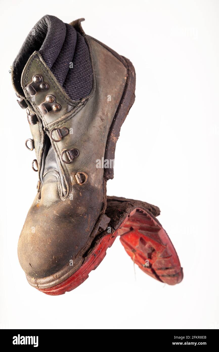 Una vecchia scarpa con la suola che si stalla Foto Stock