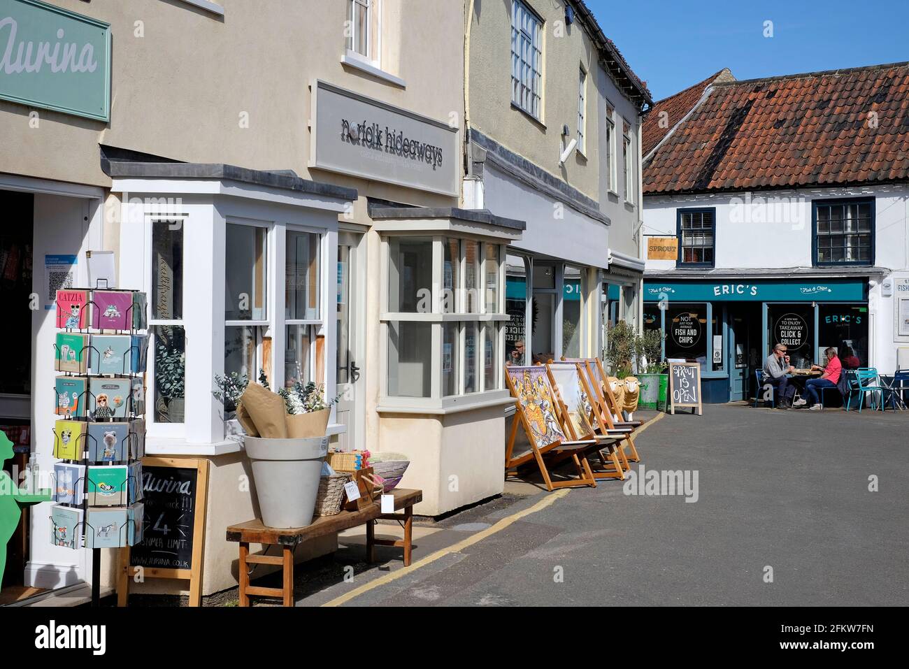 negozi su fish hill, holt, norfolk settentrionale, inghilterra Foto Stock