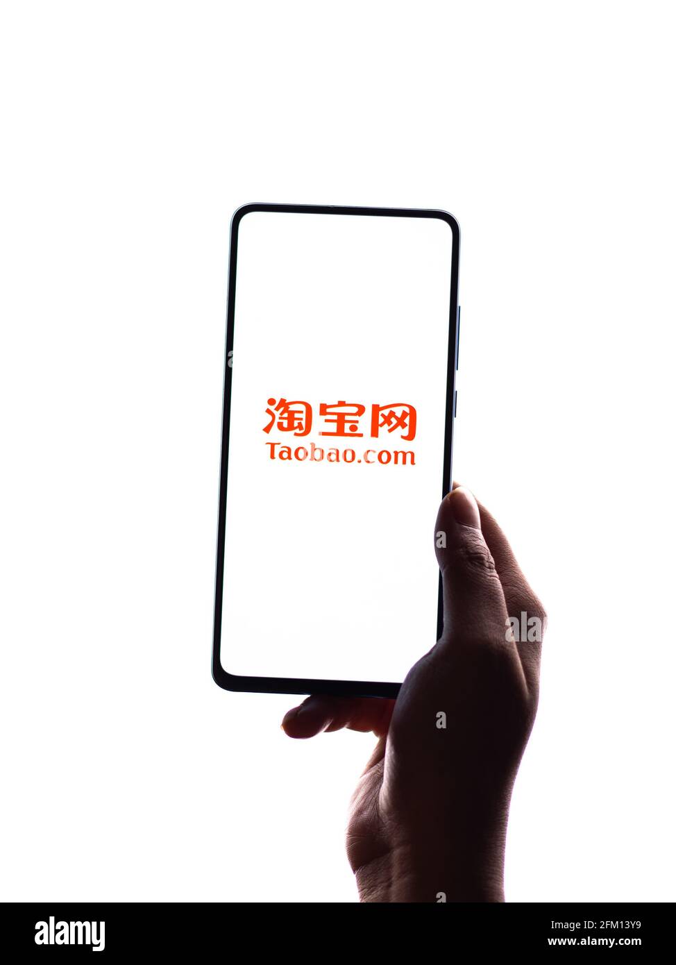 Assam, india - 04 Maggio 2021 : il logo di Taobao sull'immagine di riserva dello schermo del telefono. Foto Stock