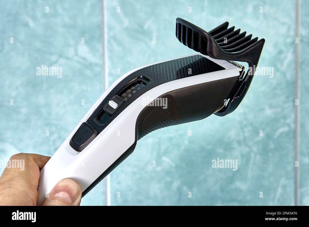 Regolacapelli wireless elettrico per uso domestico. Foto Stock