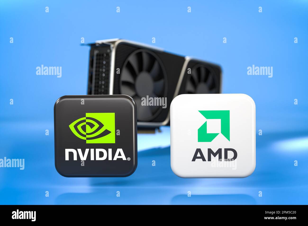 Logo delle aziende tecnologiche concorrenti che progettano chip per schede grafiche nvidia e AMD di fronte a una scheda grafica sfocata. Foto Stock