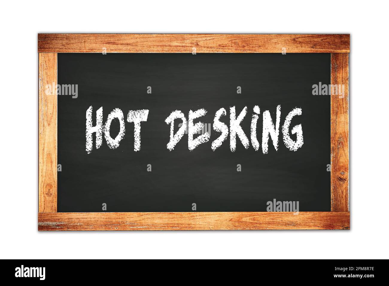 TESTO DI DESKING CALDO scritto su lavagna nera della scuola della cornice di legno. Foto Stock