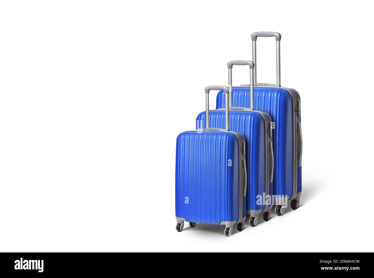 Valigia blu di diverse dimensioni su sfondo bianco Foto Stock