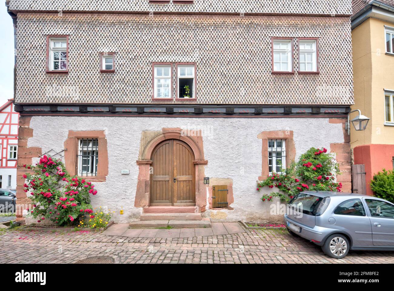 Benderhaus, casa a graticcio, porta anteriore, ingresso, facciata casa, Estate, Schlitz, Vogelbergskreis, Hesssen, Germania, Europa Foto Stock