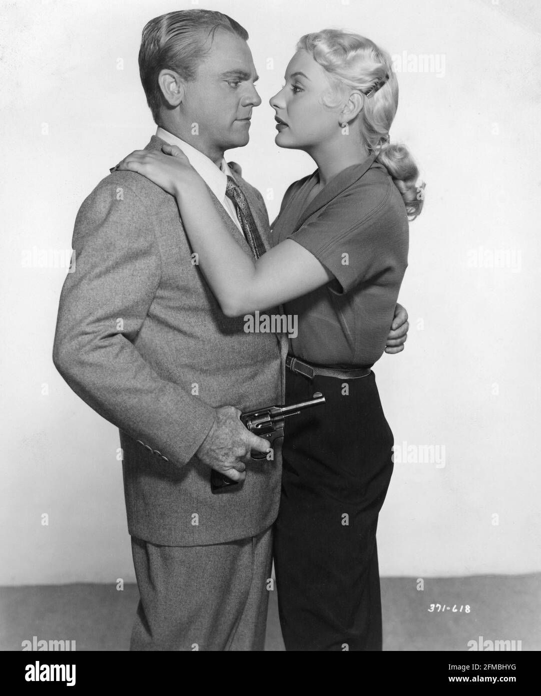 JAMES CAGNEY e BARBARA PAYTON pubblicità posa per BACIO DOMANI ADDIO 1950 regista GORDON DOUGLAS sceneggiatura Harry Brown dal romanzo di Horace McCoy William Cagney Productions / Warner Bros. Foto Stock