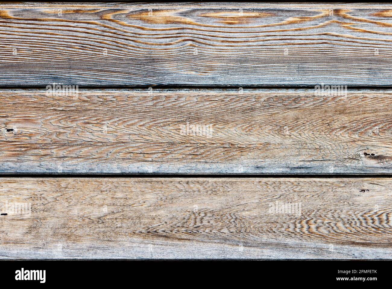 Tre pannelli orizzontali in legno naturale di colore marrone chiaro Foto Stock