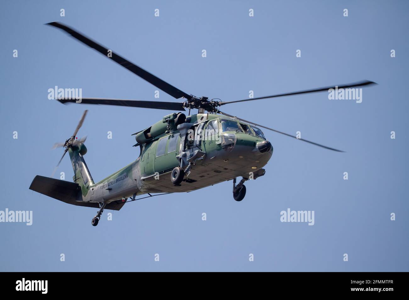 Helicóptero e avião militarista Foto Stock