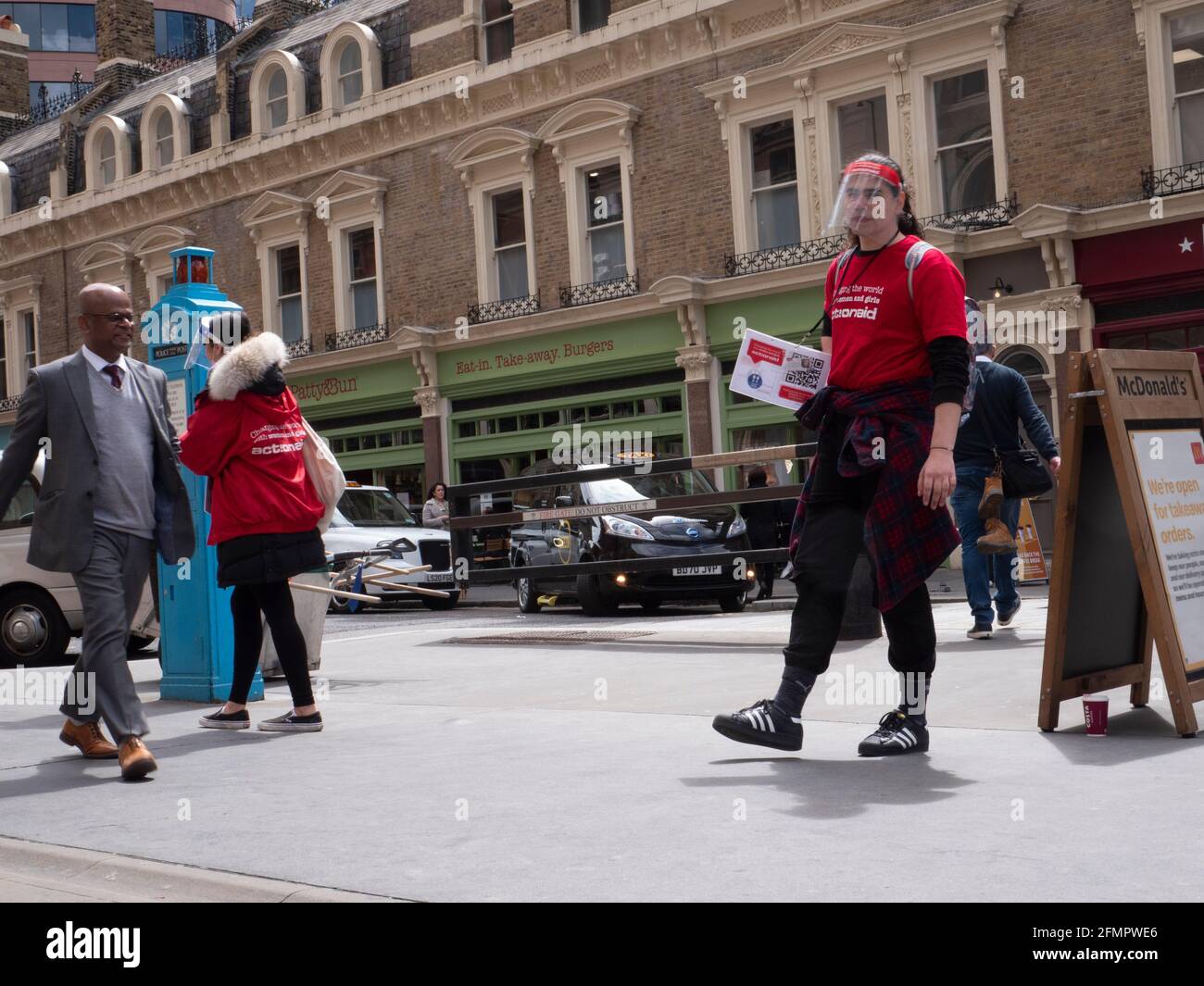 ActionAid, Action Aid beneficenza fundraisers, comunemente noto come chuggers operano nel centro di Londra Foto Stock