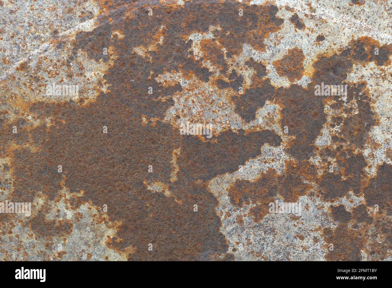 Struttura superficiale in metallo arrugginito - ruggine e fondo metallico ossidato. Foto Stock