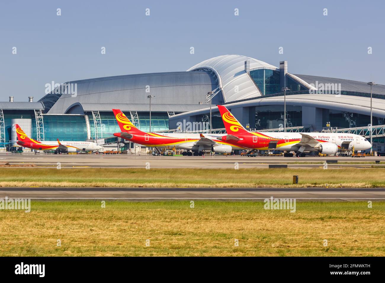 Guangzhou, Cina - 23 settembre 2019: Aerei Hainan Airlines all'aeroporto di Guangzhou Baiyun (CAN) in Cina. Foto Stock