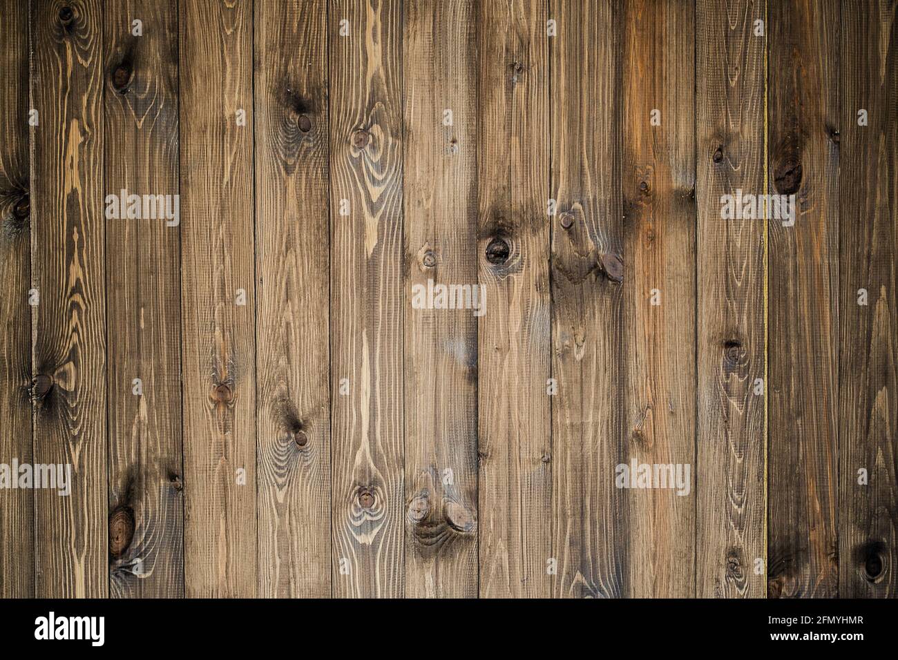 primo piano di parete fatta di tavole di legno. Legno di fondo. Spazio di copia Foto Stock