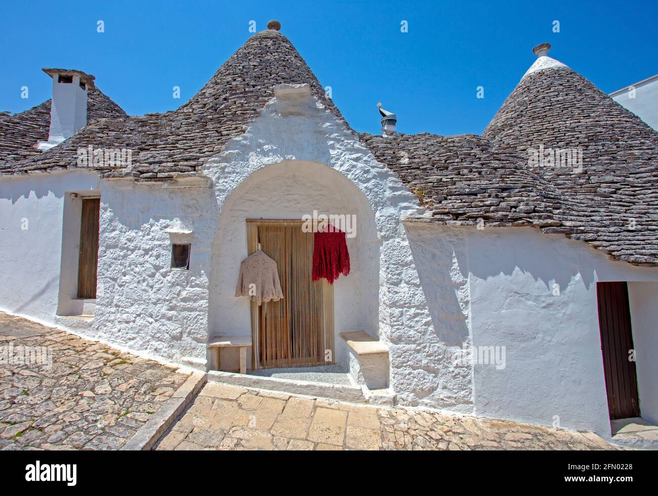 Alberobello, Italia. Alberobello è un piccolo paese vicino Bari, Puglia, Italia meridionale. Il centro storico di Alberobello è famoso per il suo trullo unico Foto Stock