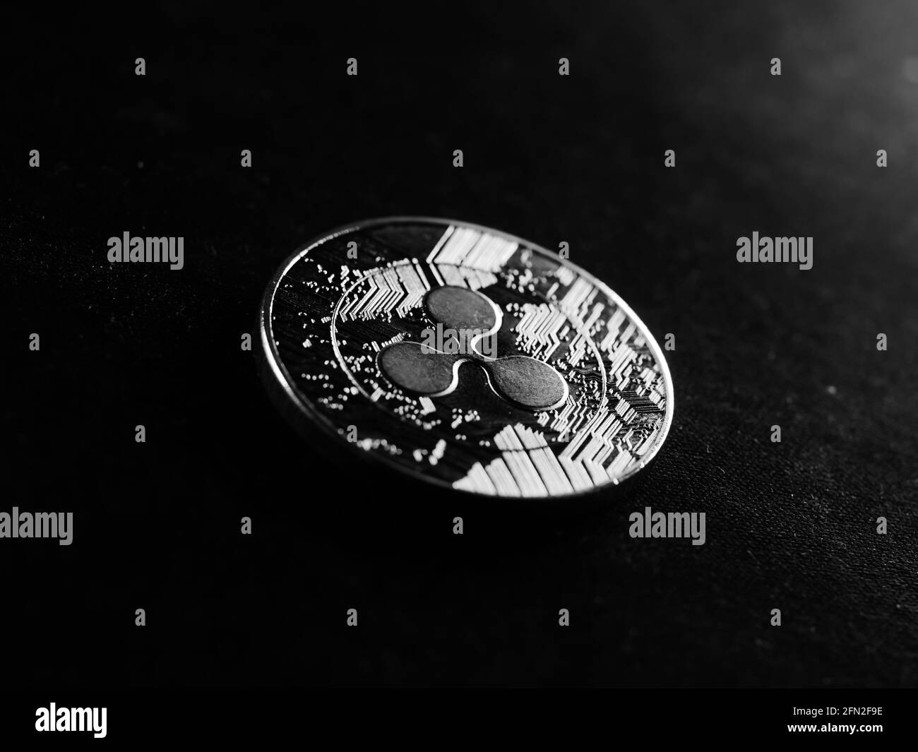 Immagine in scala di grigi della valuta criptata Foto Stock