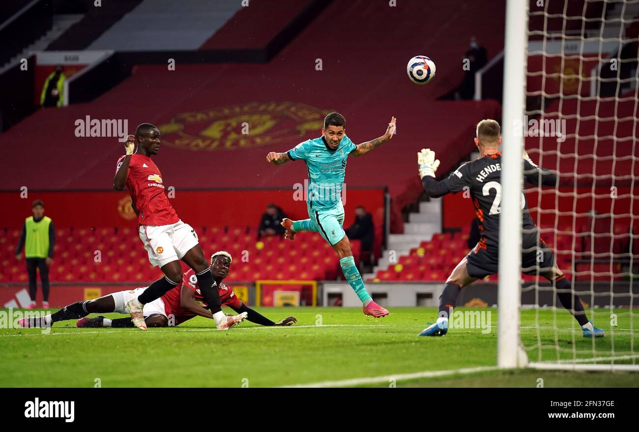 Roberto Firmino di Liverpool segna il secondo gol della partita durante la partita della Premier League a Old Trafford, Manchester. Data immagine: Giovedì 13 maggio 2021. Foto Stock