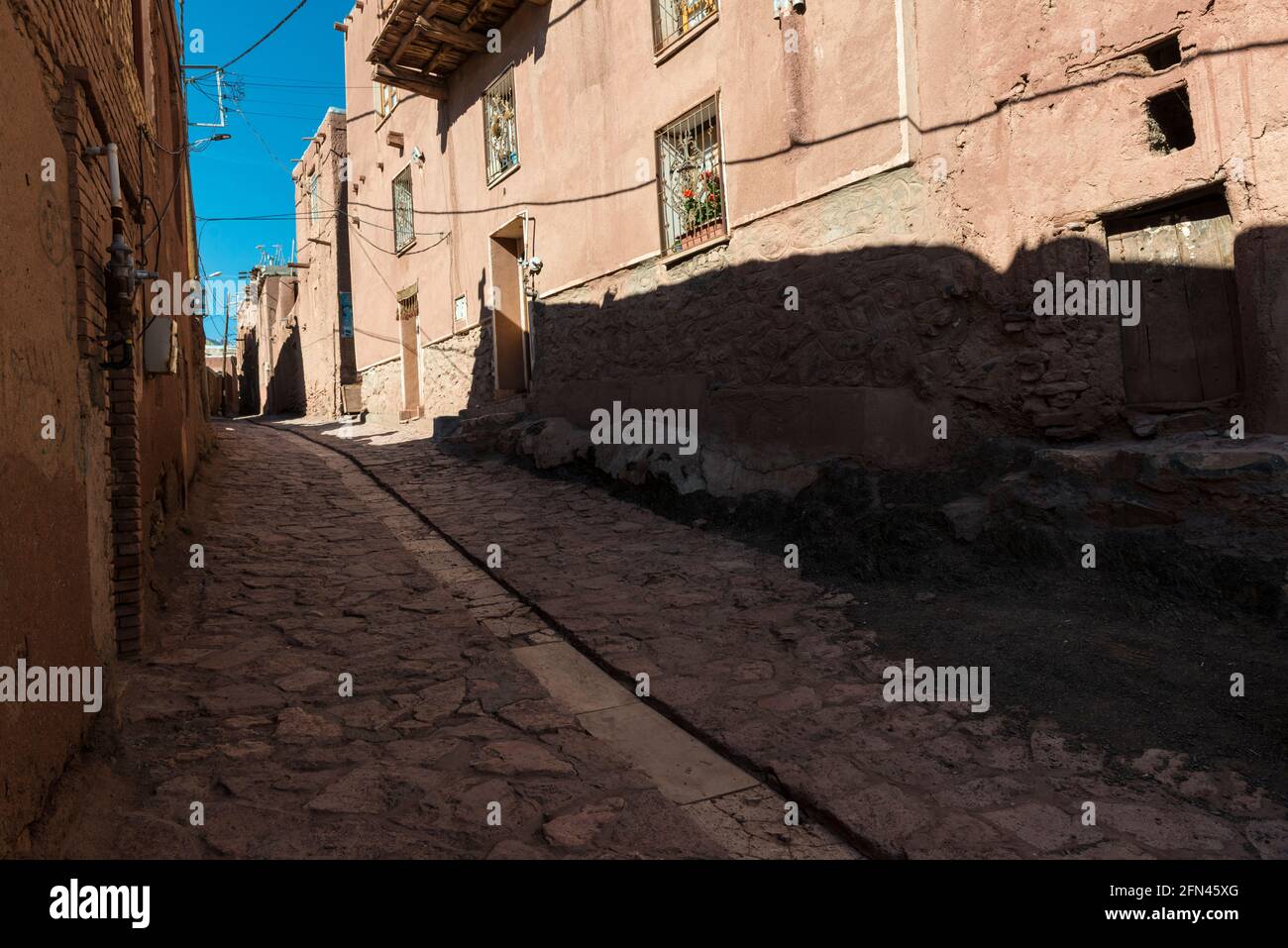 Tubi di terra di colore rosso nell'antico villaggio Abyaneh, provincia di Isfahan, Iran. Foto Stock