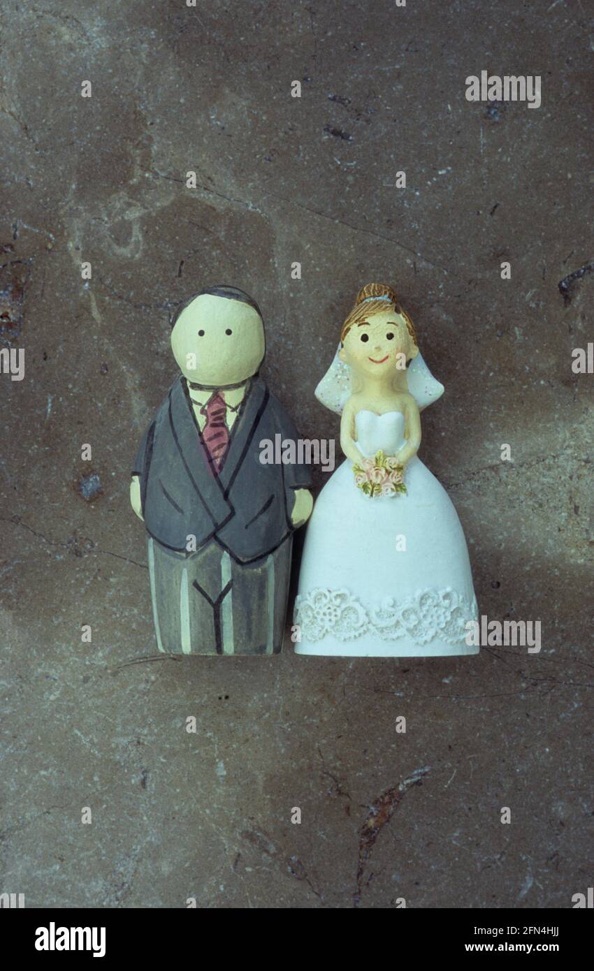 Modelli di sposo e sposo di matrimonio o padre in piedi fianco a fianco Foto Stock