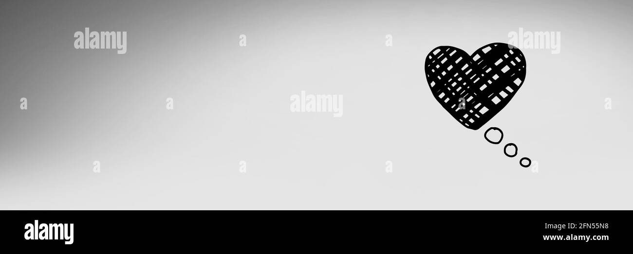 Composizione del cuore nero con spazio di copia su sfondo grigio Foto Stock