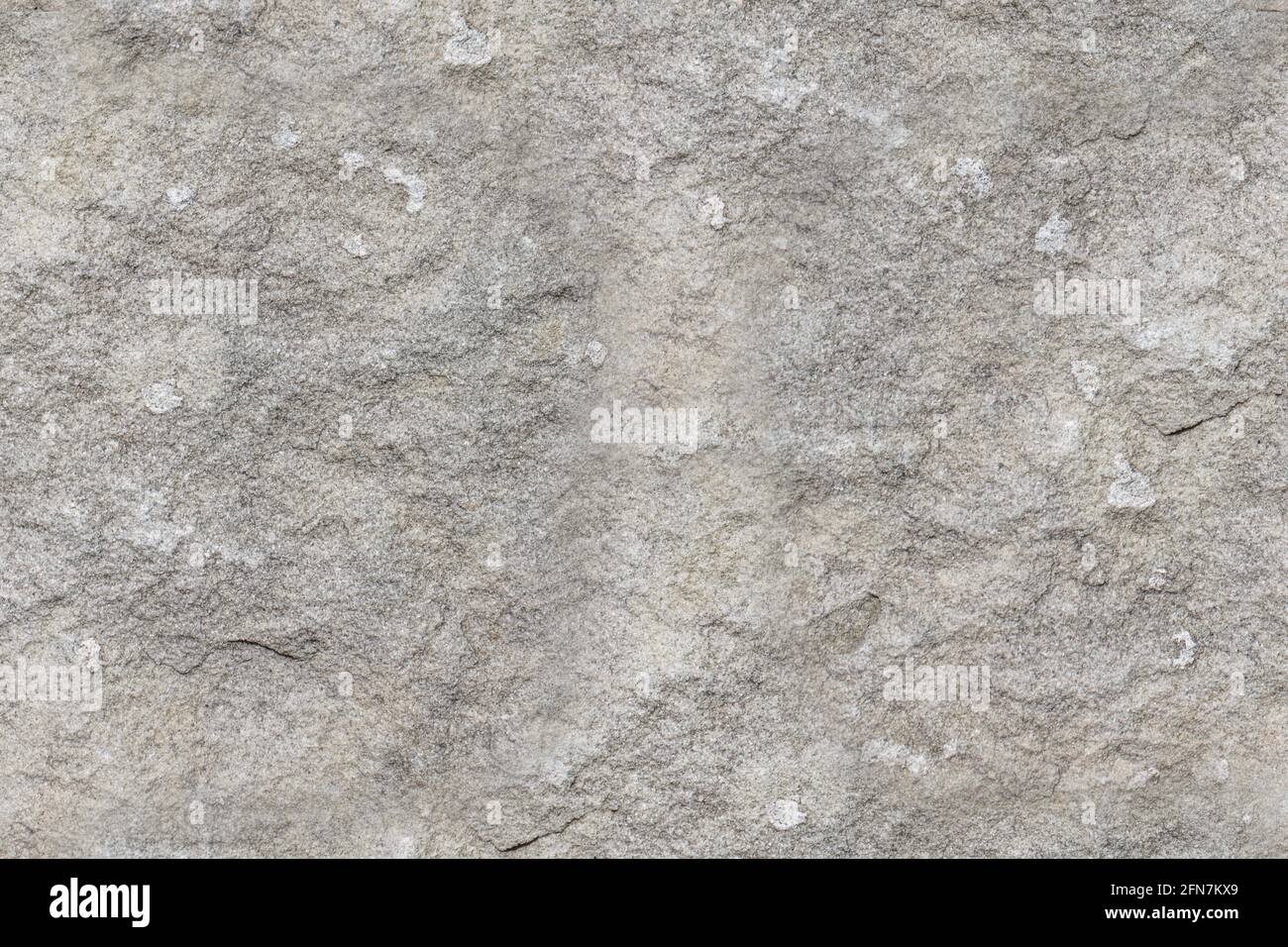 Texture di pietra senza giunture. Grana sporca. Sfondo muro di pietra. Superficie in calcestruzzo ruvida con disegno senza giunture. Foto Stock