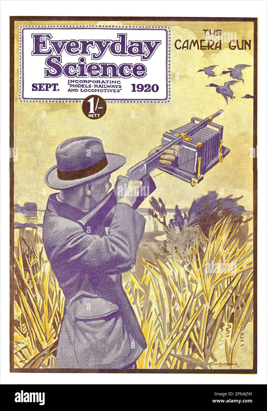 Copertina vintage della rivista Everyday Science per settembre 1920, con un uomo che usa una pistola per fotocamera. Foto Stock