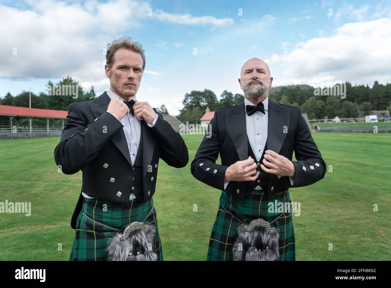 GRAHAM MCTAVISH E SAM HEUGHAN IN UOMINI IN KILT: UN ROADTRIP CON SAM E GRAHAM (2021), DIRETTO DA KEVIN JOHNSTON. Credit: Sony Pictures Television / Starz! / Album Foto Stock