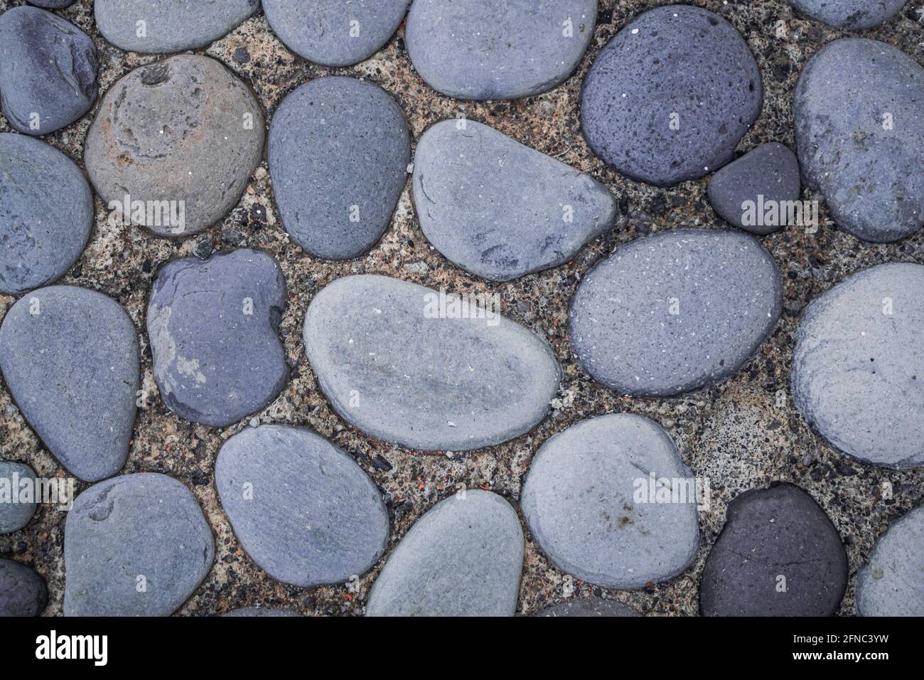 Spiaggia rotonda pavimento in pietra Foto Stock