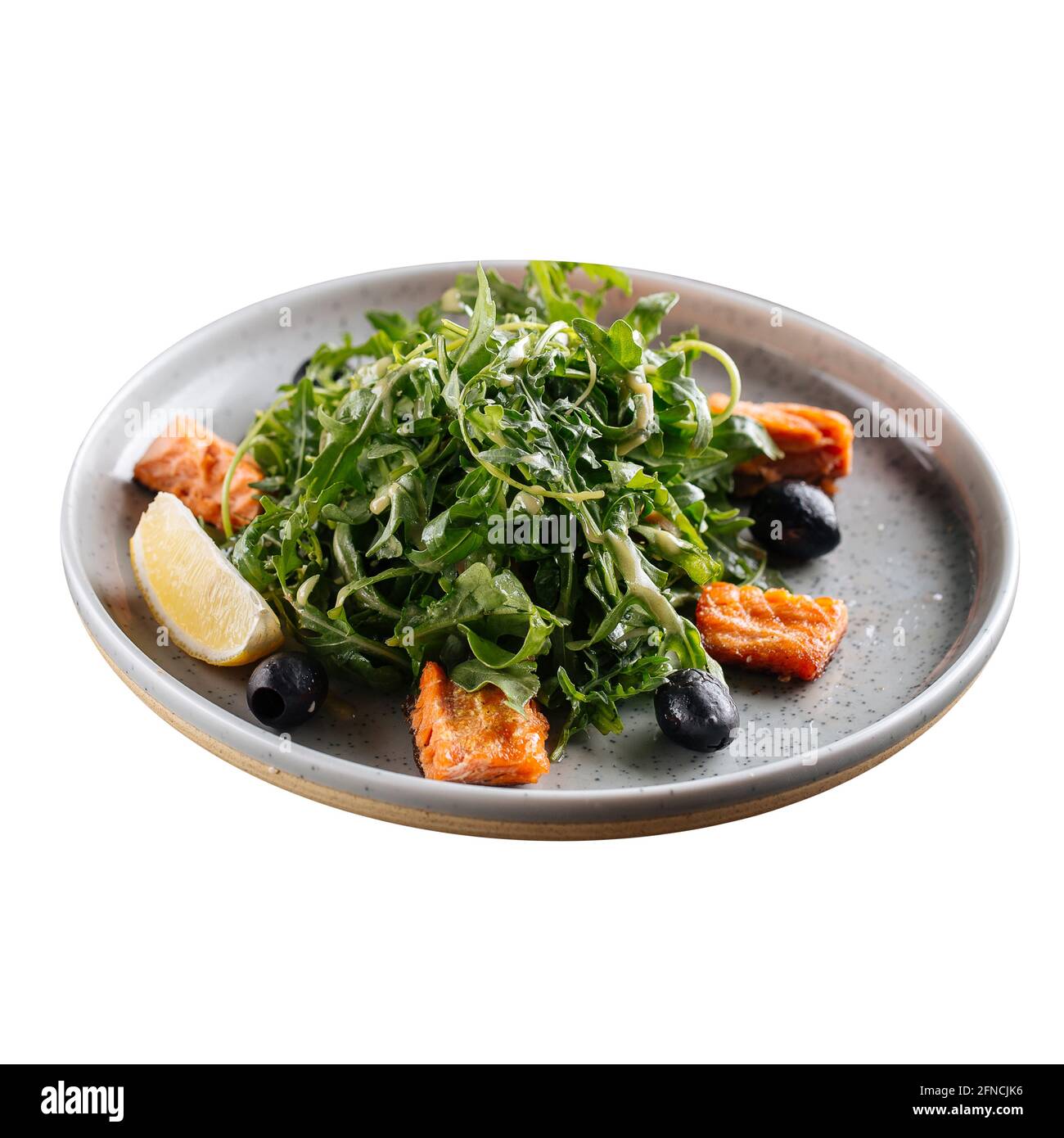 Piatto isolato di salmone arrosto e insalata di rucola Foto Stock