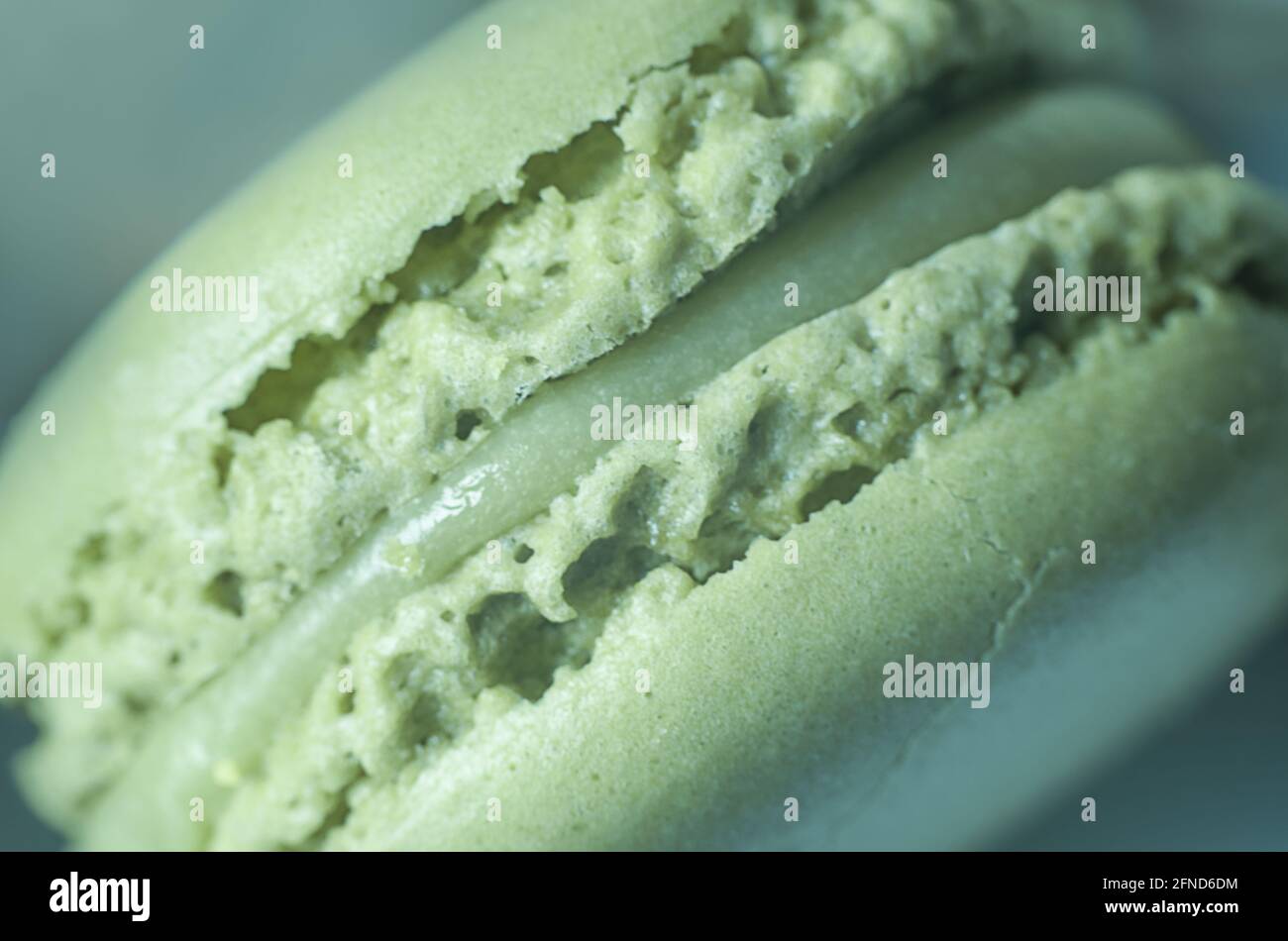 Macaroon verde. Concetto di cucina, cucina e cibo. Primo piano. Foto Stock