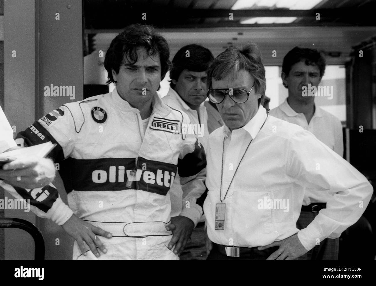 Gran Premio del Belgio a Zolder 31.05.1985 Nelson Piquet (a sinistra) e il boss di Formula 1 Bernie Ecclestone nella pit lane. [traduzione automatizzata] Foto Stock