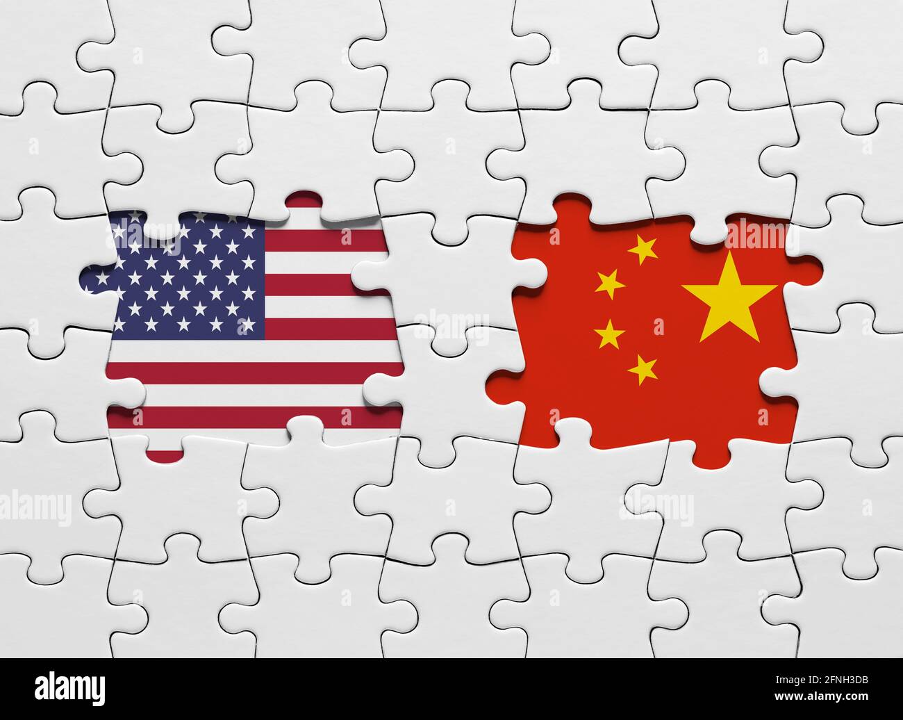 Puzzle con le bandiere nazionali degli Stati Uniti d'America e della Cina. Conflitto internazionale e concetto di guerra commerciale. Foto Stock