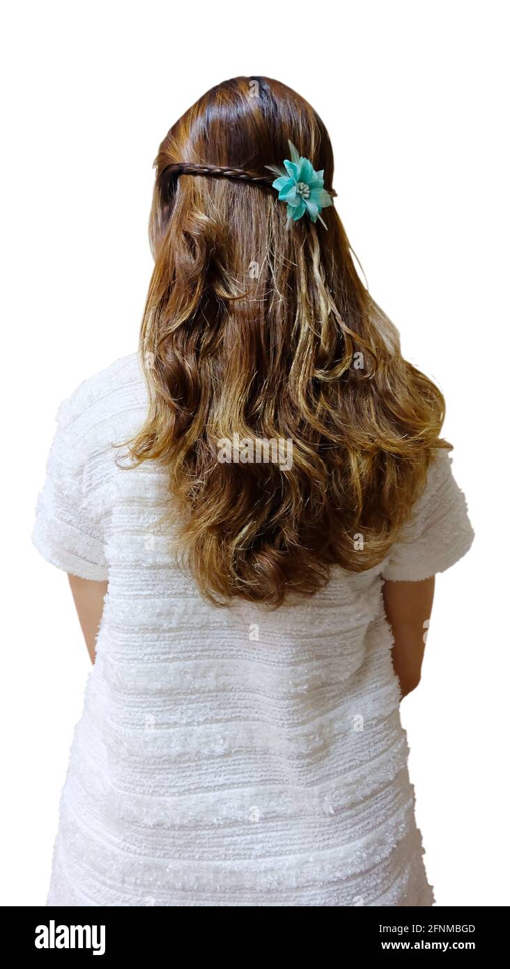 Vista posteriore di una giovane donna con lunghi capelli brunette con estremità riccia, Foto Stock