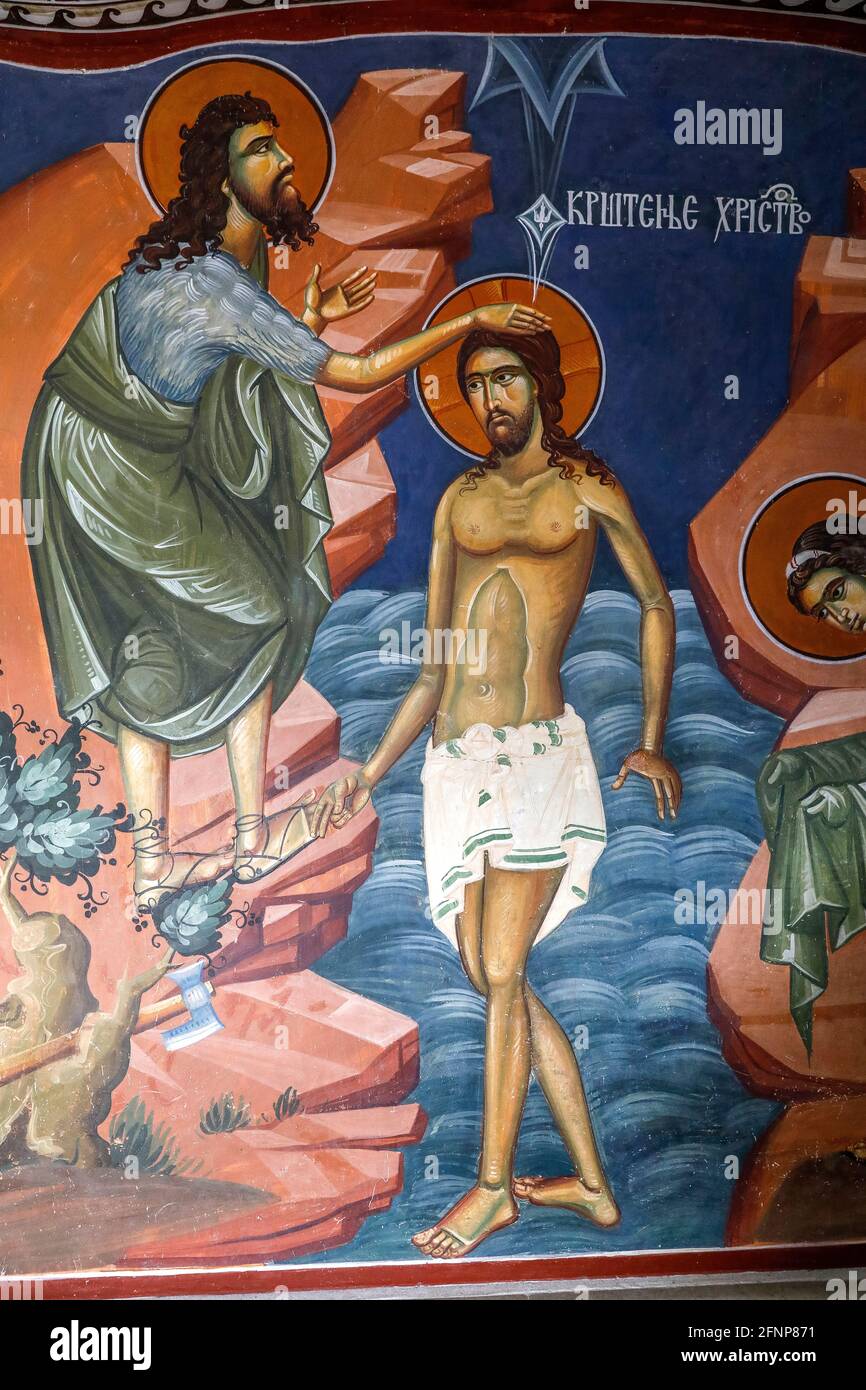 Monastero ortodosso di Ostrog, dedicato a San Basilio di ostrog, Montenegro. Affresco raffigurante il battesimo di Gesù Foto Stock