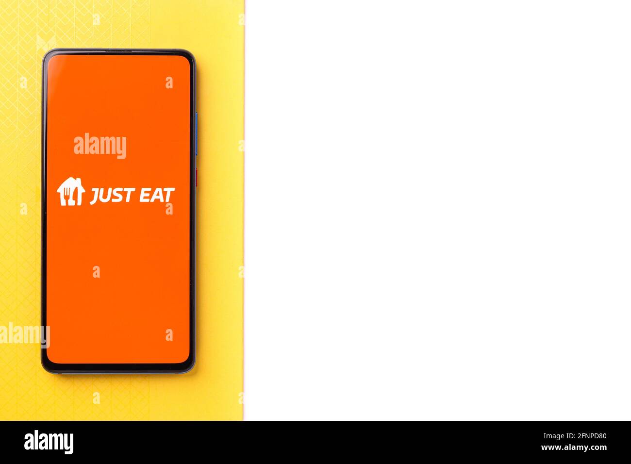 Assam, india - 18 maggio 2021 : Just eat logo on phone screen stock image. Foto Stock
