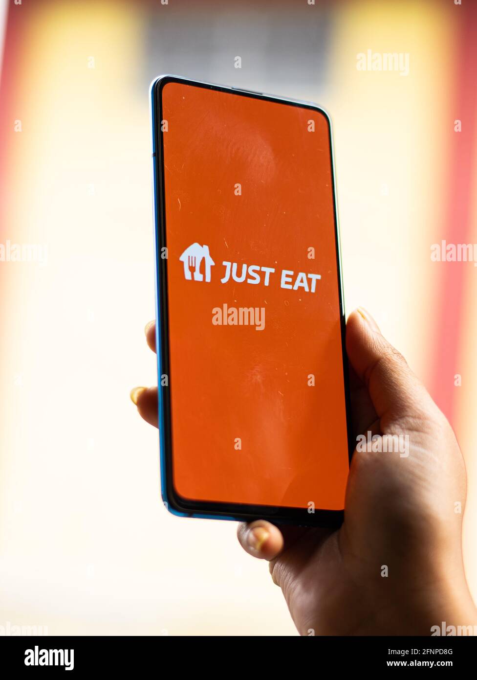 Assam, india - 18 maggio 2021 : Just eat logo on phone screen stock image. Foto Stock