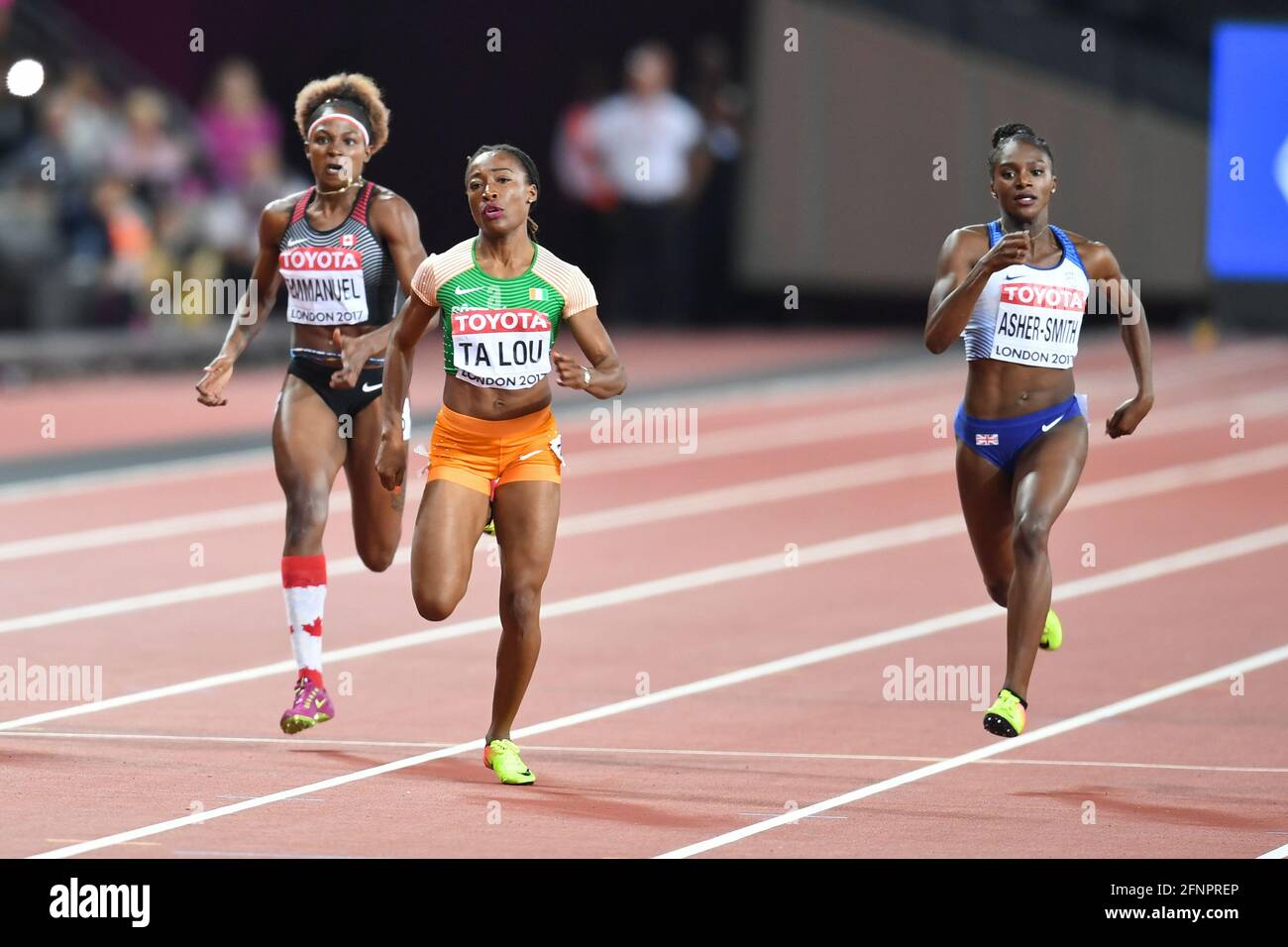 Marie-Josée Ta Lou (CIV), Dina Asher-Smith (GBR), Crystal Emmanuel (CAN). 200 metri donne, semi-finale. IAAF Athletics World Championships Londra 2017 Foto Stock