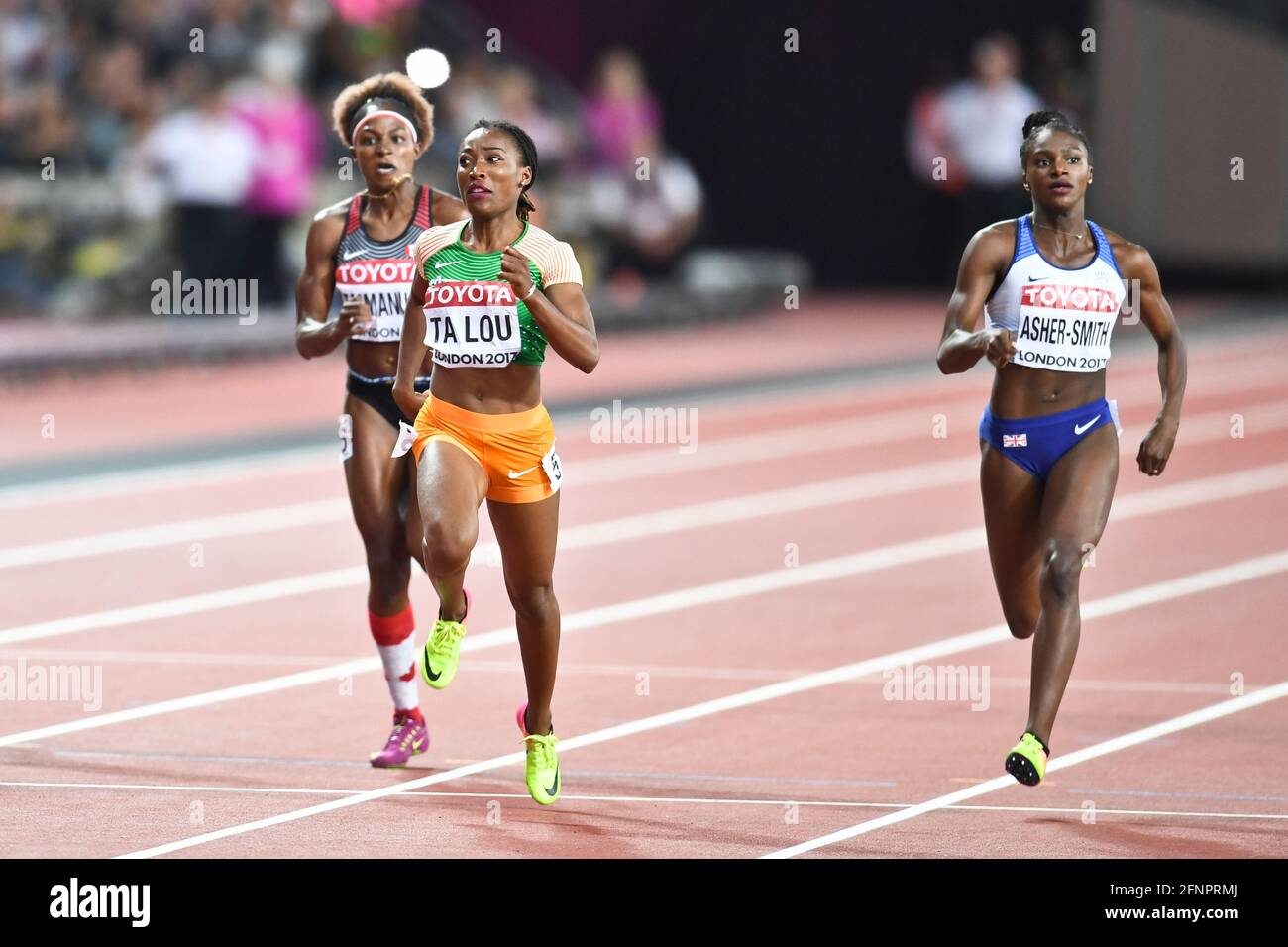 Marie-Josée Ta Lou (CIV), Dina Asher-Smith (GBR), Crystal Emmanuel (CAN). 200 metri donne, semi-finale. IAAF Athletics World Championships Londra 2017 Foto Stock