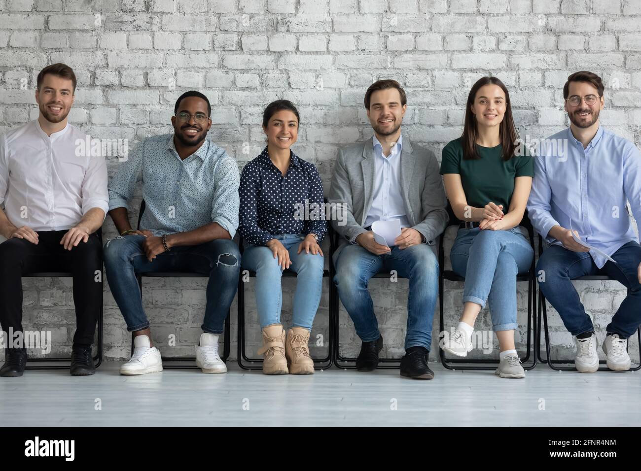 Ritratto di gruppo di diversi candidati per la posizione nella società internazionale Foto Stock