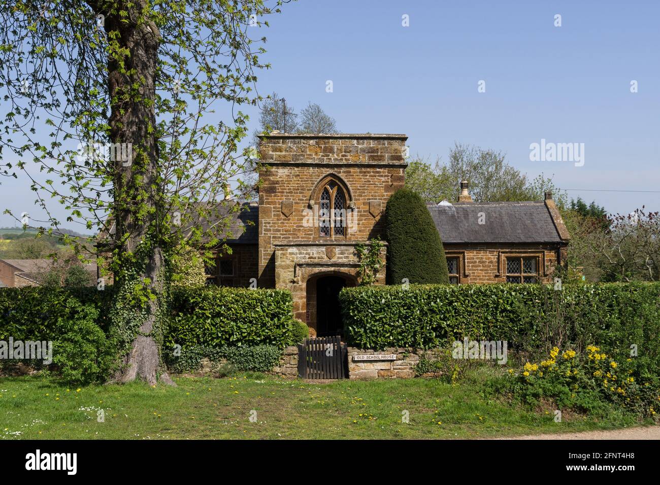 The Old School House nel villaggio di Badby, Northamptonshire, UK; Grade II edificio listato dal 1812 da James Wyatt Foto Stock