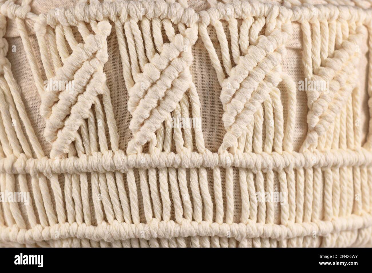 Macramé, una forma di tessuto prodotto con tecniche di annodatura Foto Stock